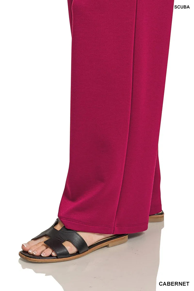 Wide-leg cabernet scuba pants with black strappy sandals.