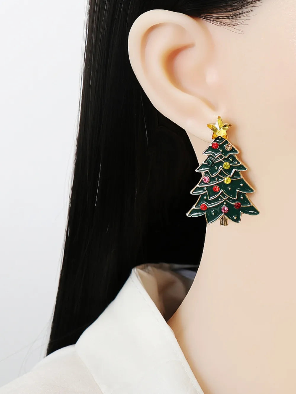 Alloy inlaid rhinestone Christmas tree earrings, 1.9 inches long.