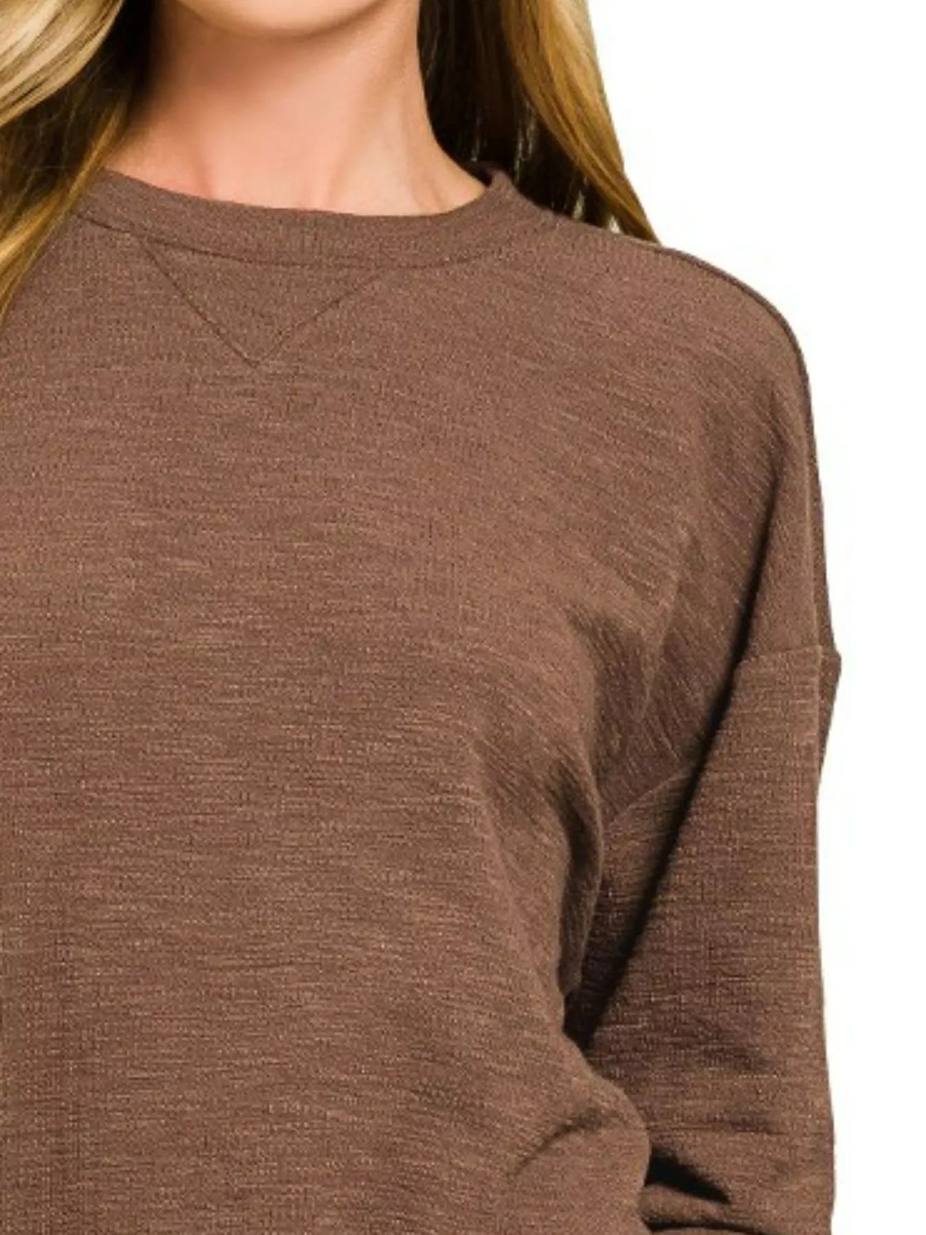 Close-up of a woman modeling the brown slub long sleeve top from the Zenana set.