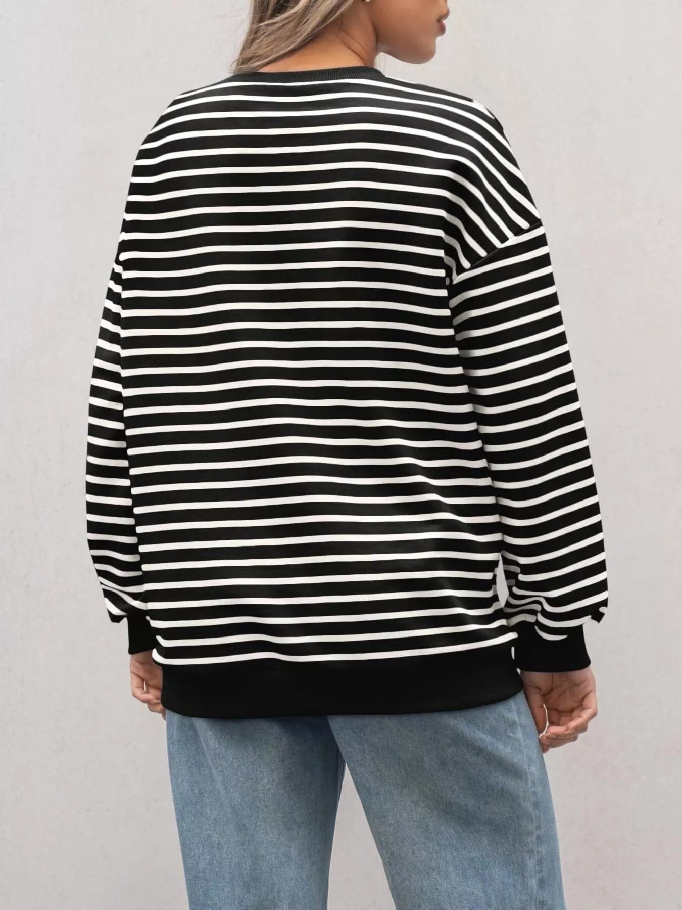 Oversized striped sweatshirt in a rayon blend with a slightly stretchy fit.