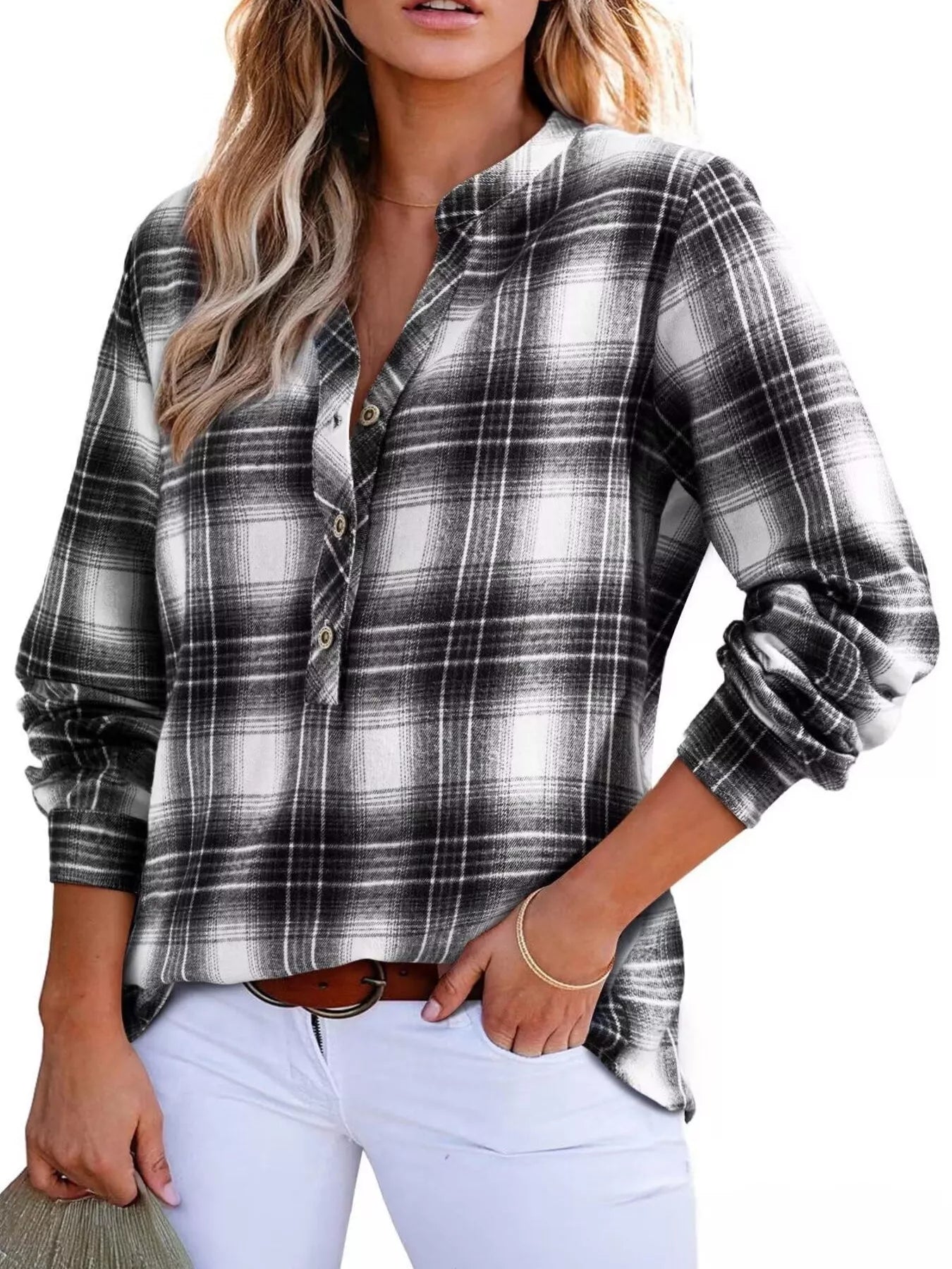 Plaid long sleeve blouse with half button front, made from a polyester blend.