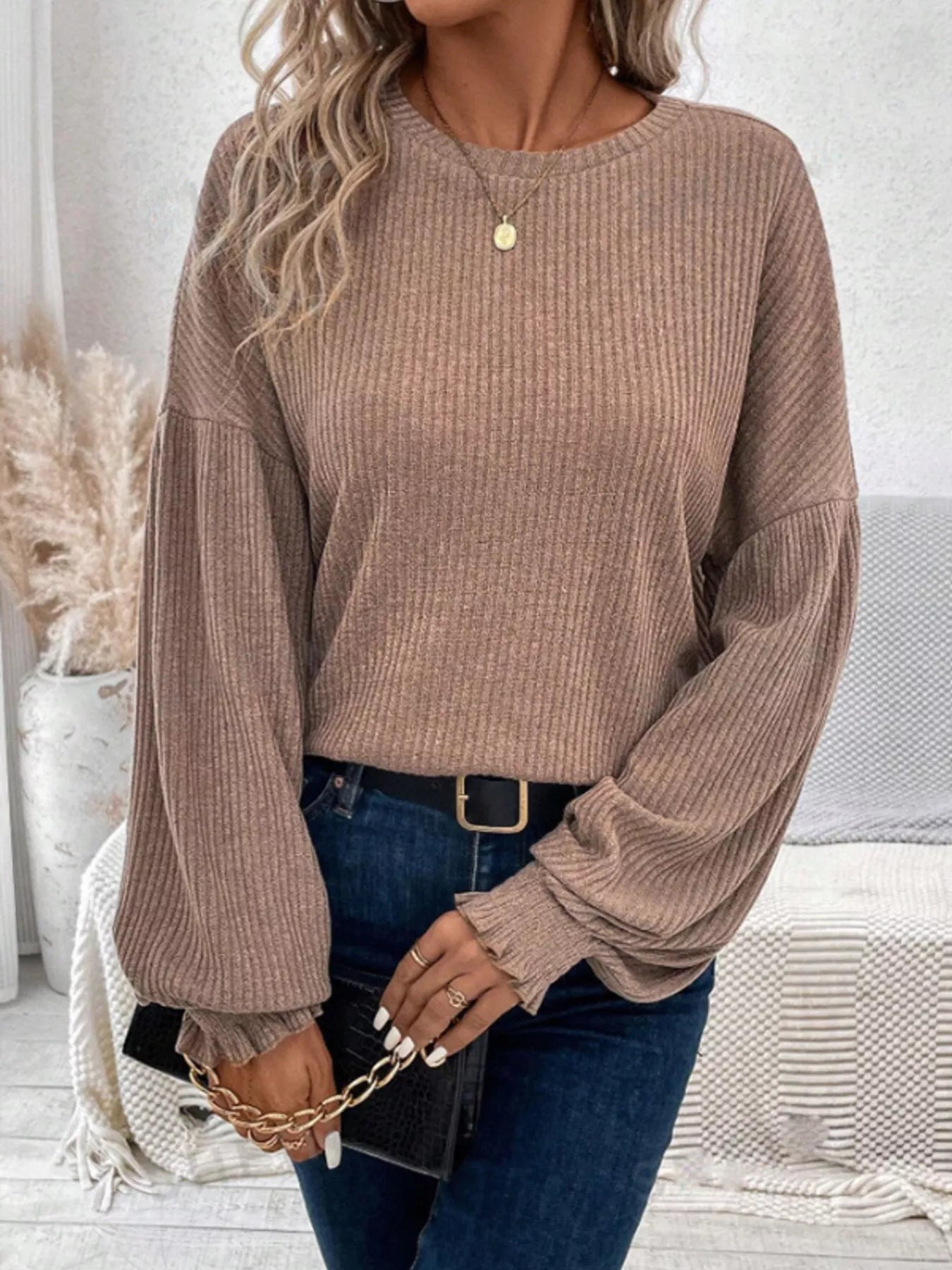 Ribbed knit long sleeve t-shirt in stretchy polyester blend with fitted silhouette