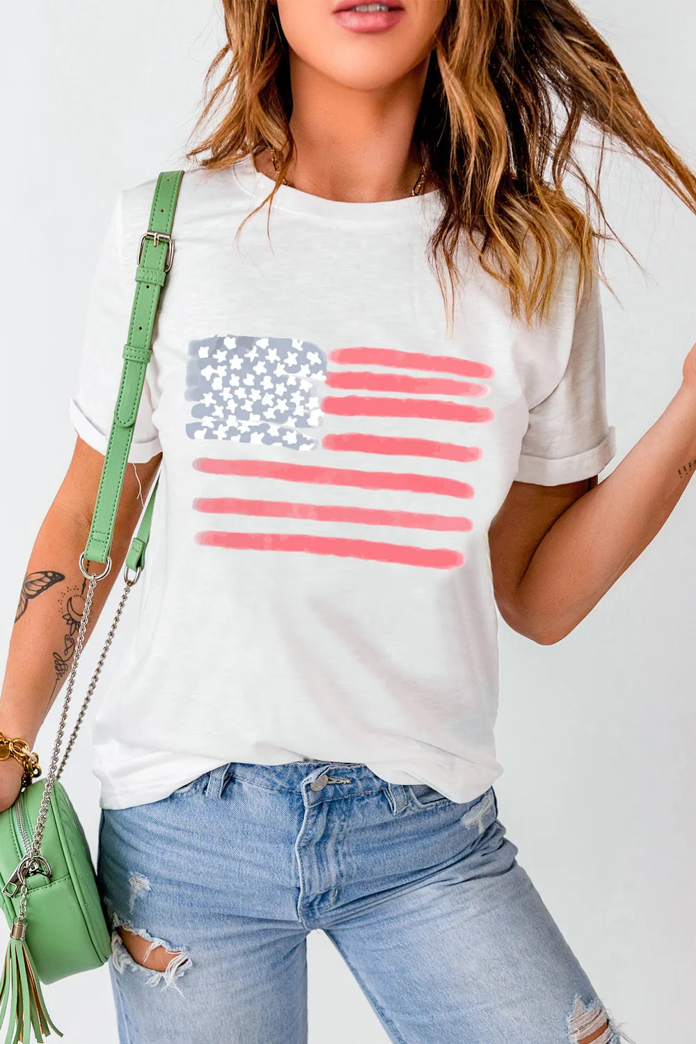 Short sleeve t-shirt featuring a US flag design in a polyester cotton blend fabric.