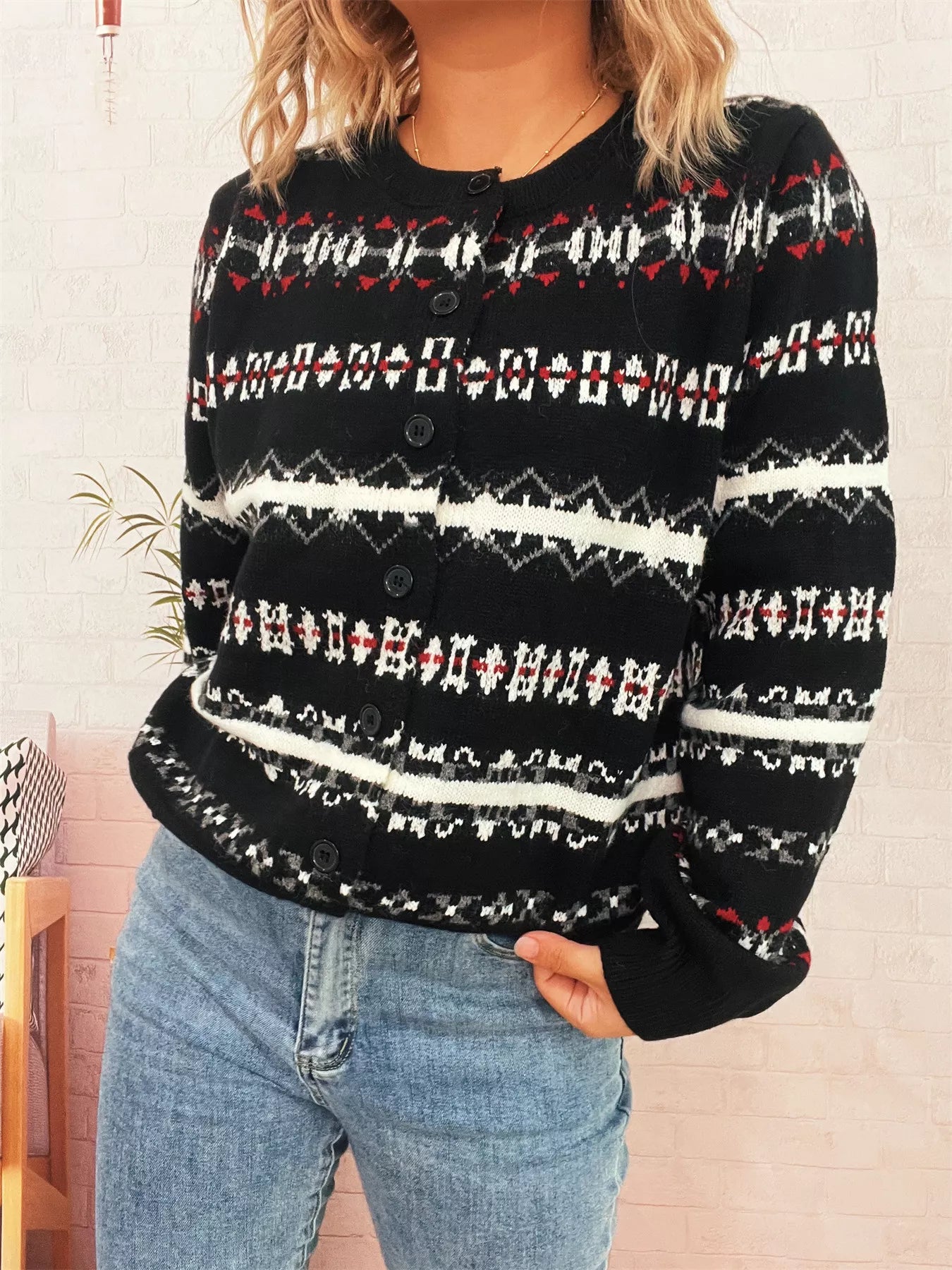 Vintage pattern button-down cardigan in polyester with long sleeves and a basic fit.