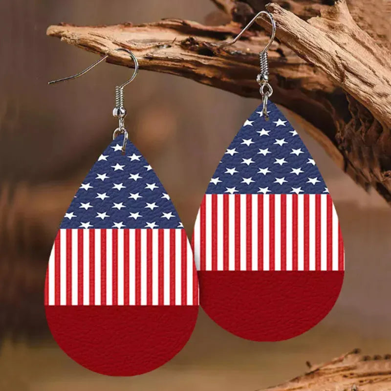 Teardrop earrings in stars and stripes design made of PU leather and alloy.