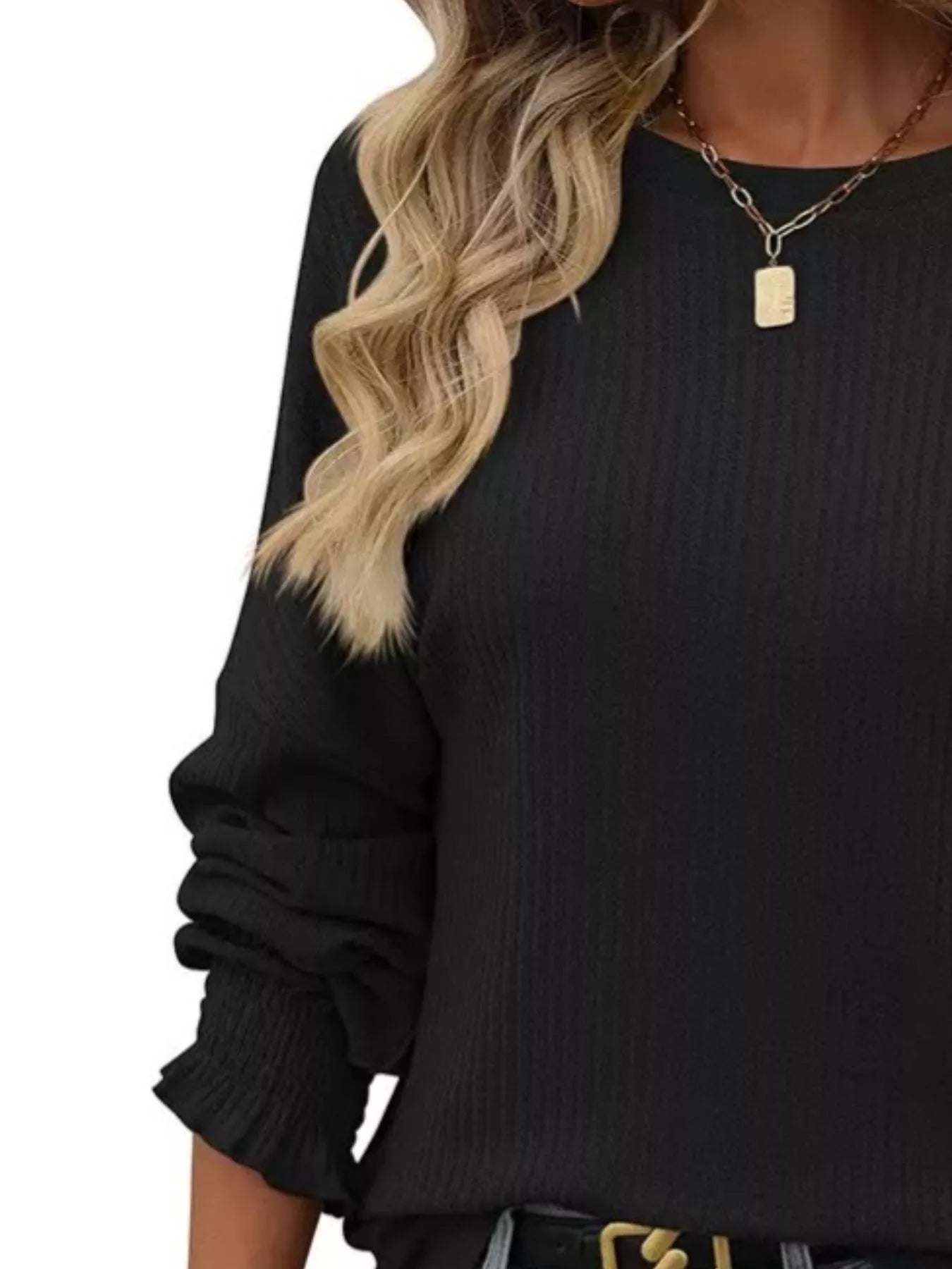 Ribbed long sleeve t-shirt in a stretchy polyester blend with a fitted design.