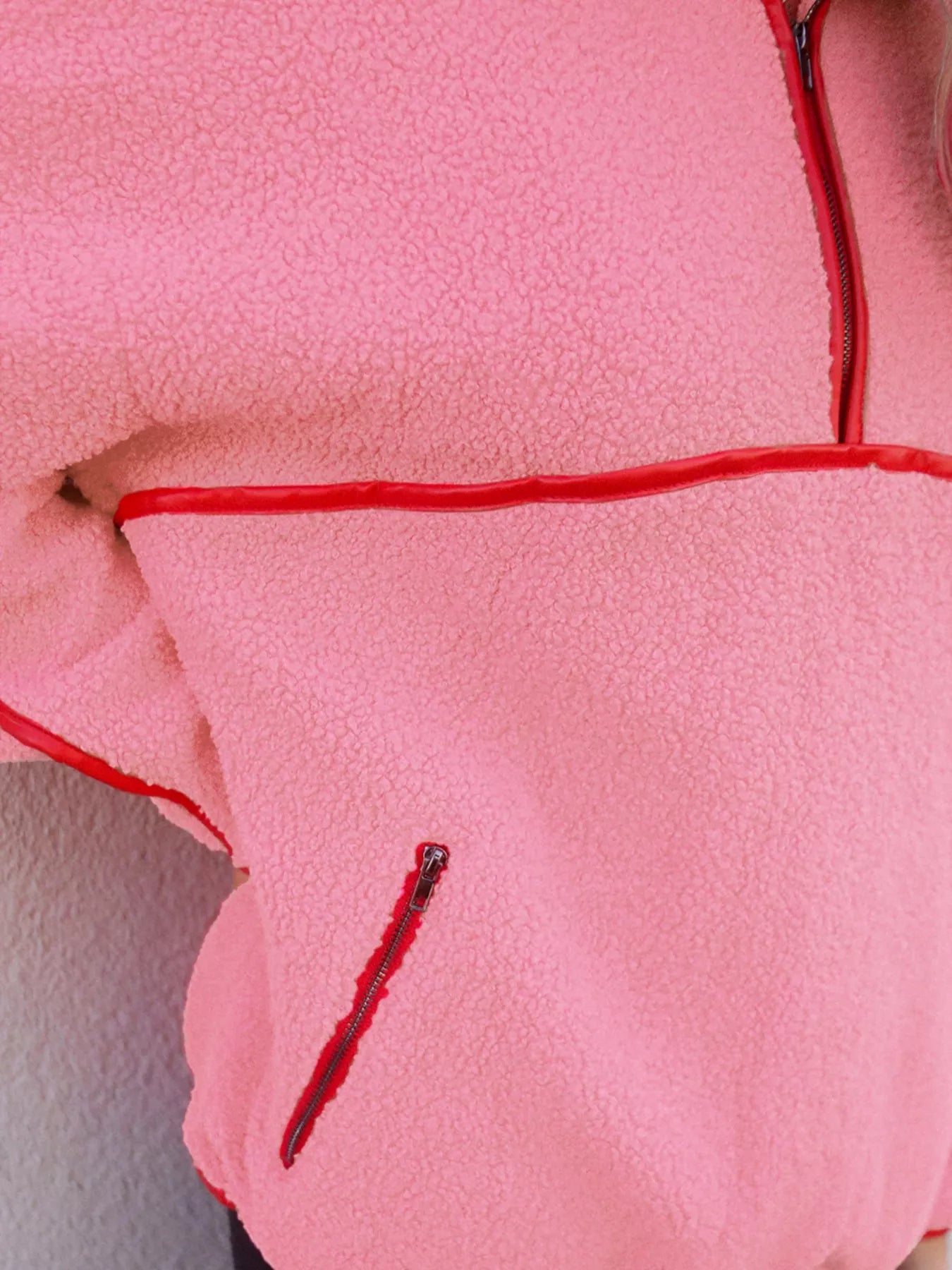 Half zip sweatshirt in Sherpa with faux leather trim and front pocket.