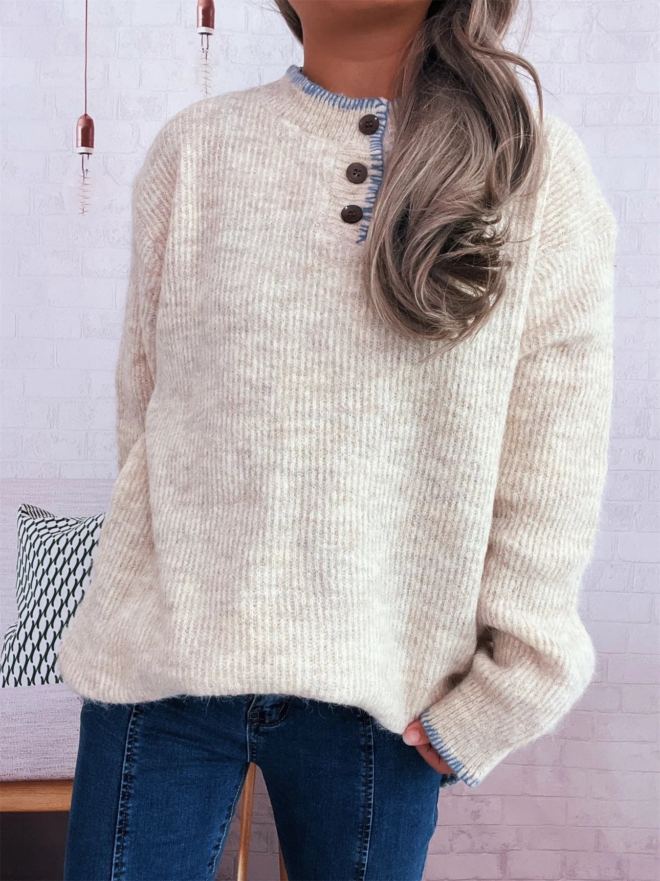 Oversized ribbed long sleeve sweater with button details and contrast stitching in polyester