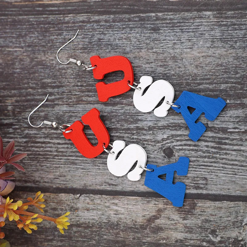 Wooden USA letter dangle earrings made of alloy and wood, measuring 3.7 inches long.