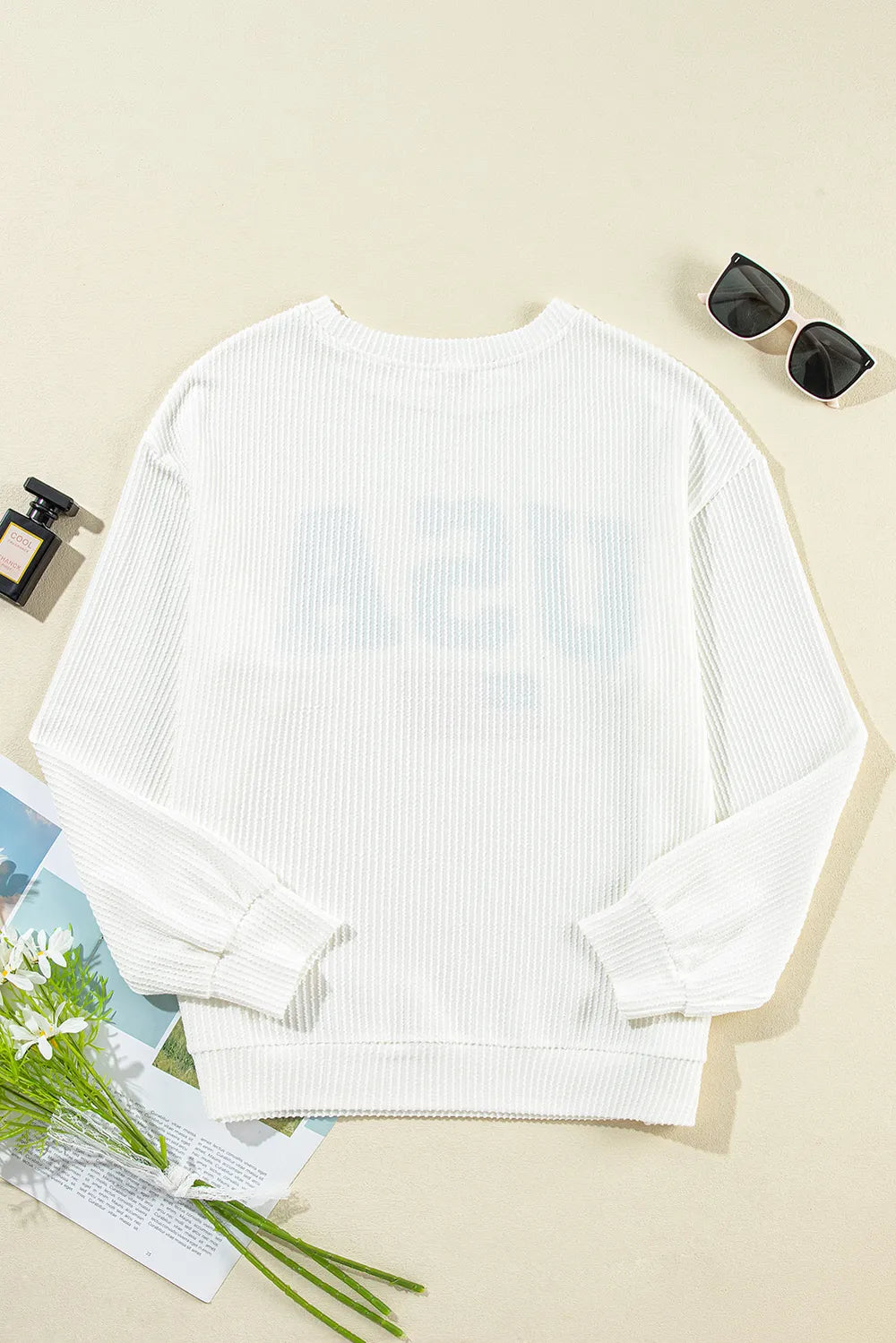 Long sleeve sweatshirt featuring a US flag design in a polyester blend fabric.