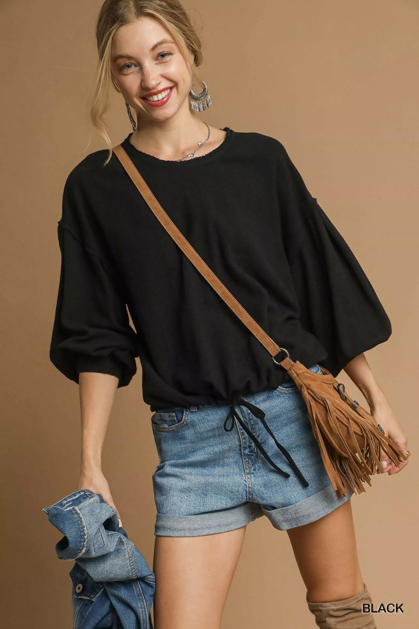 Plus-size linen long sleeve drawstring top in black.