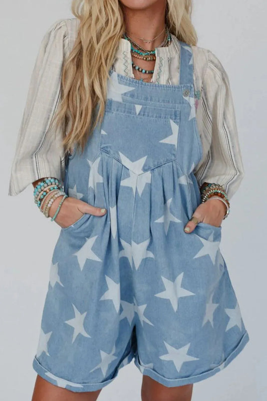 Star print denim overalls with a square neck and pocketed design.