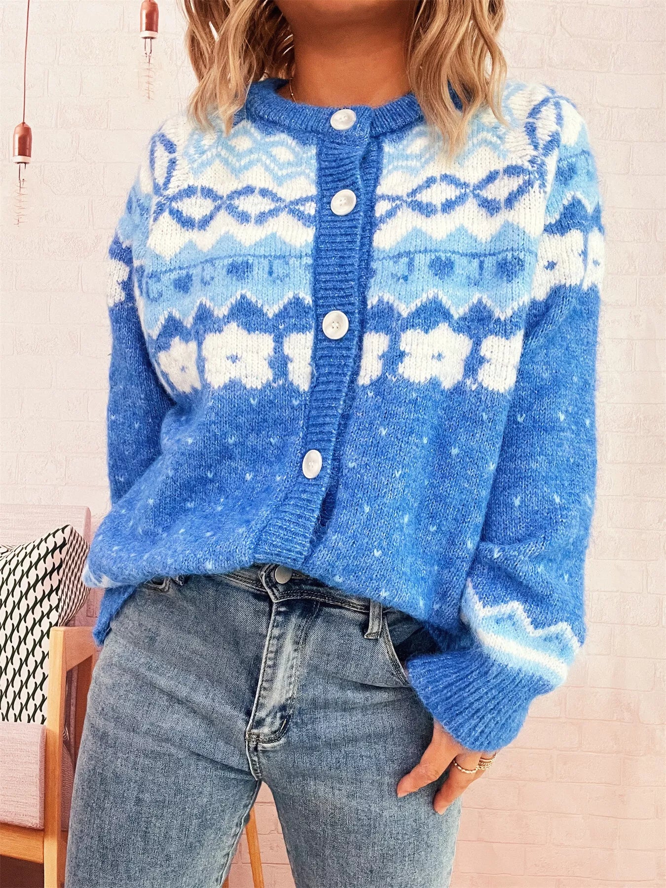 Ribbed button-down cardigan in stretchy polyester with long sleeves and a relaxed fit.