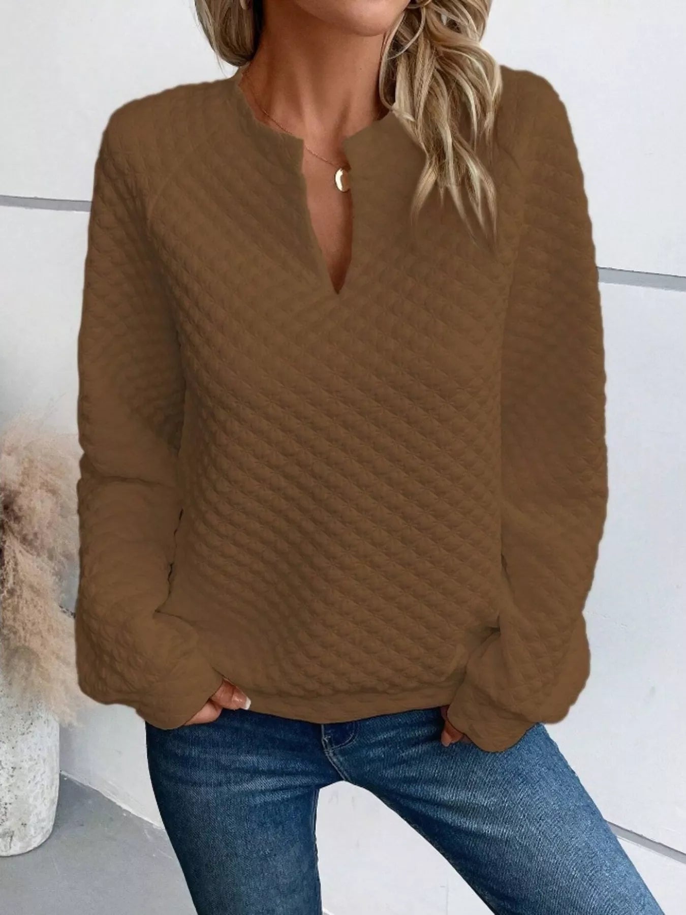 Textured sweatshirt with notched raglan sleeves in a basic style and no stretch fabric
