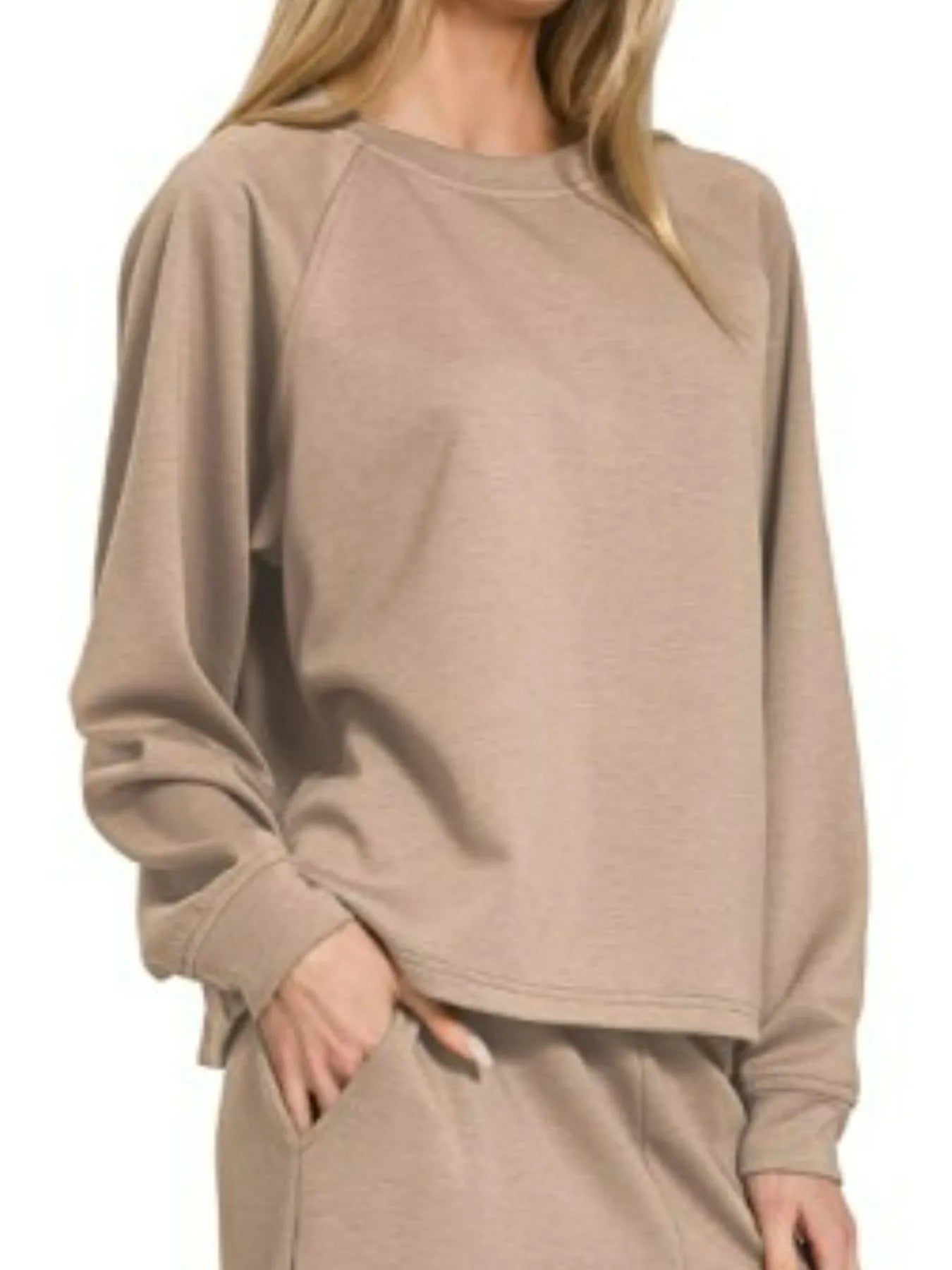 Woman modeling a cocoa-colored oversized crewneck sweatshirt and wide-leg palazzo pants set.