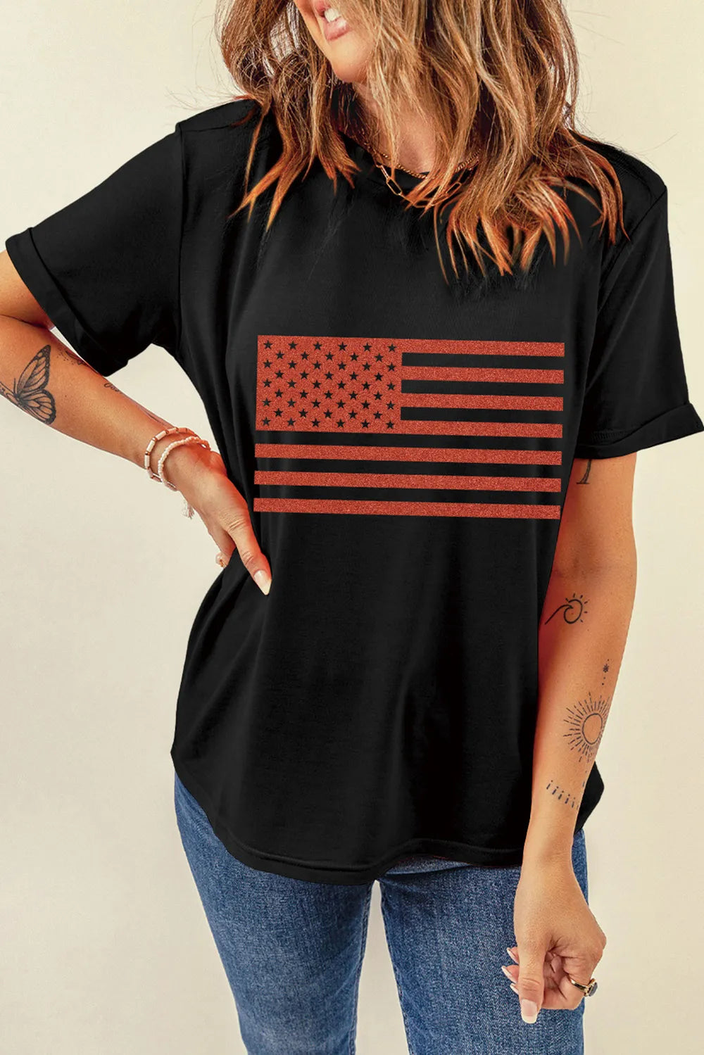 Short sleeve US flag t-shirt with a round neck in a polyester blend fabric.