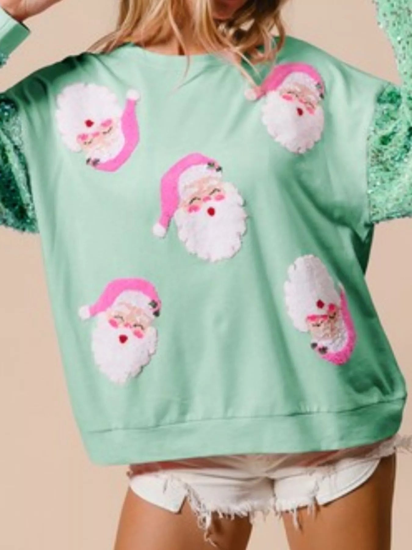 Sequin long sleeve sweatshirt with subtle sparkle and comfortable fit in festive style