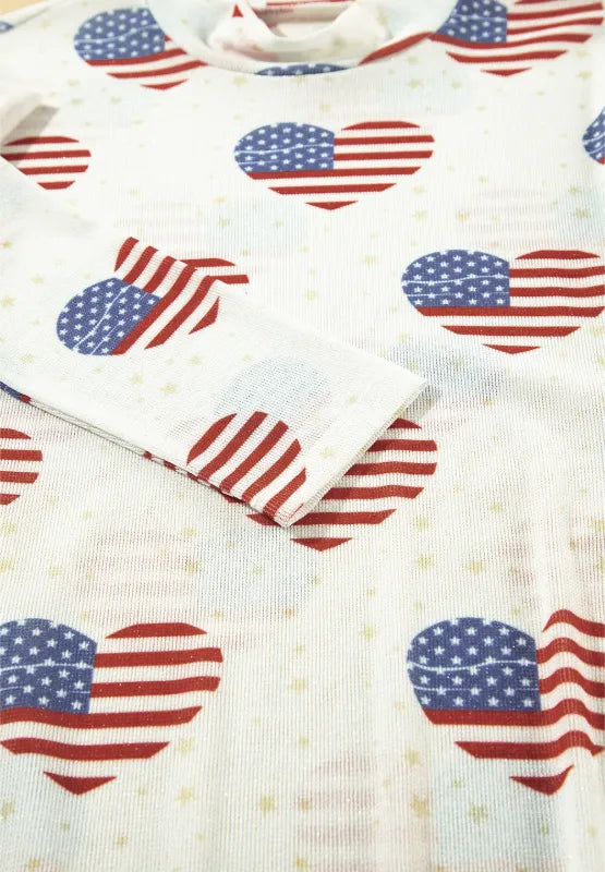 Sheer long sleeve bodysuit with US flag heart design and slightly stretchy fabric.