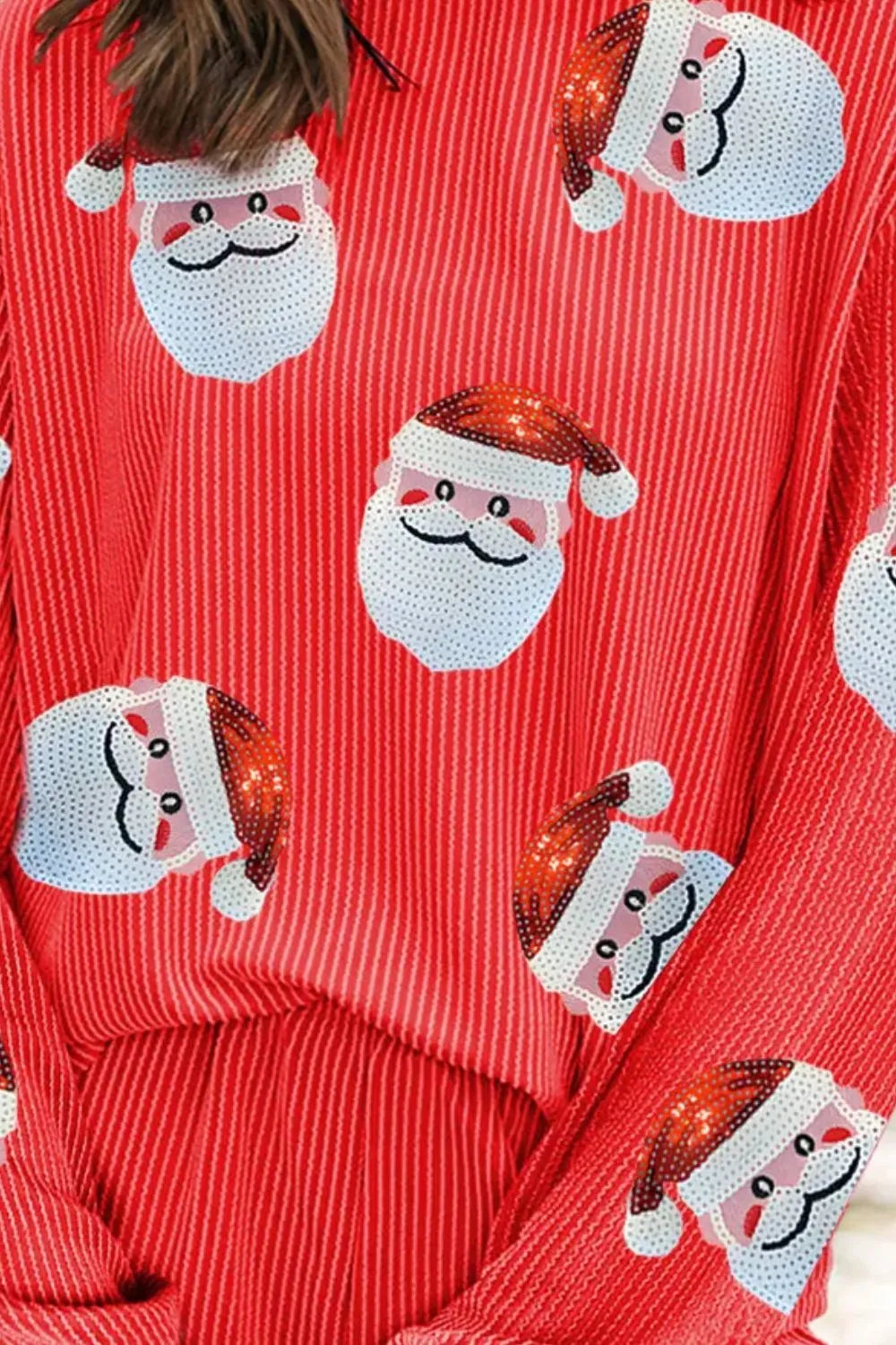 Red sequin Santa long sleeve top and shorts set with embroidered Santa faces.
