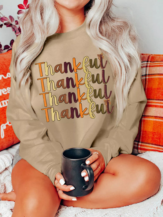 Light gray drop shoulder sweatshirt made of cotton-polyester blend with a casual fit.