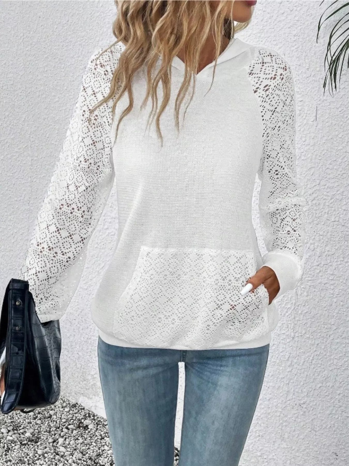 Lace sleeve hoodie with kangaroo pocket in a stretch polyester blend.