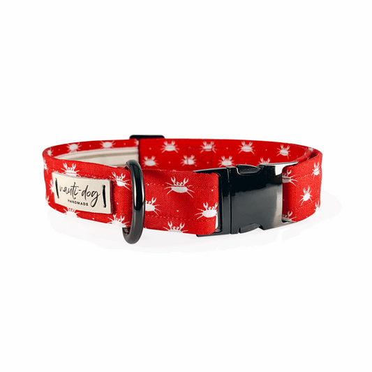 Red dog collar with white crab pattern and black buckle and ring