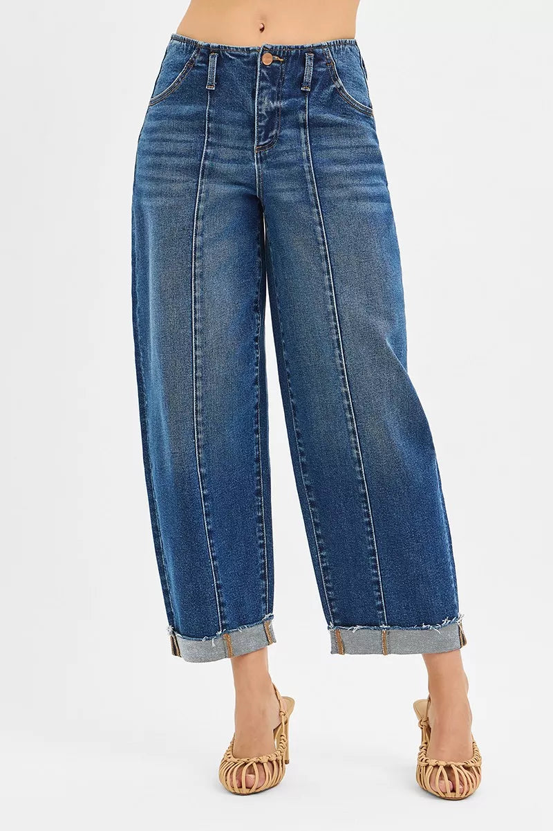 High-rise barrel cuffed jeans in stretch denim with raw hems and contrast stitching.