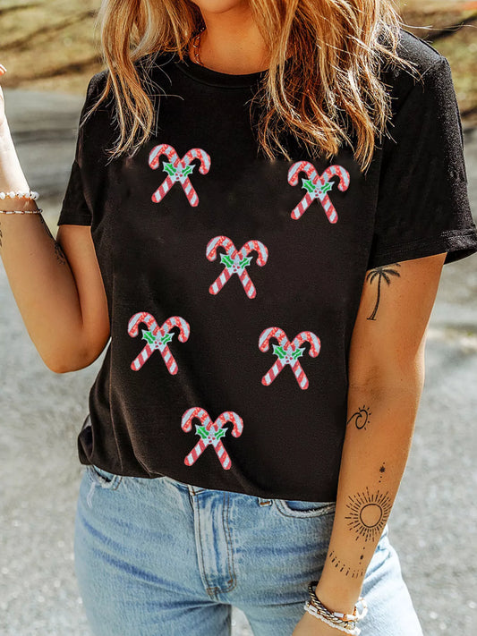 Short sleeve t-shirt with red and white candy cane sequins on a white background.