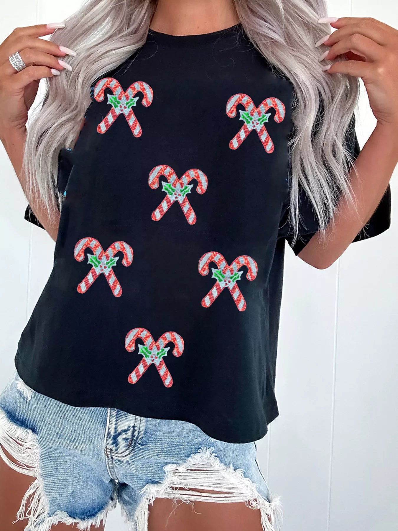 Short sleeve t-shirt with candy cane sequins and a relaxed fit in coastal colors.