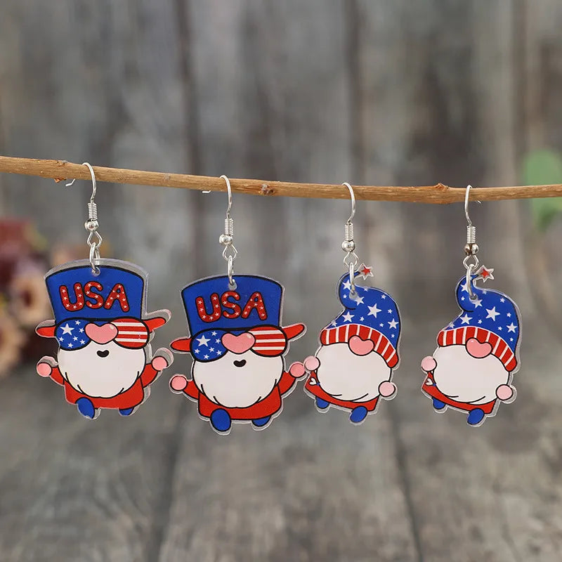 Two pairs of acrylic gnome earrings with alloy accents, measuring 2.4 inches long.