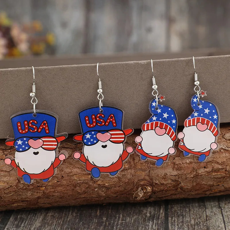 Two pairs of acrylic gnome earrings with alloy accents, each 2.4 inches long