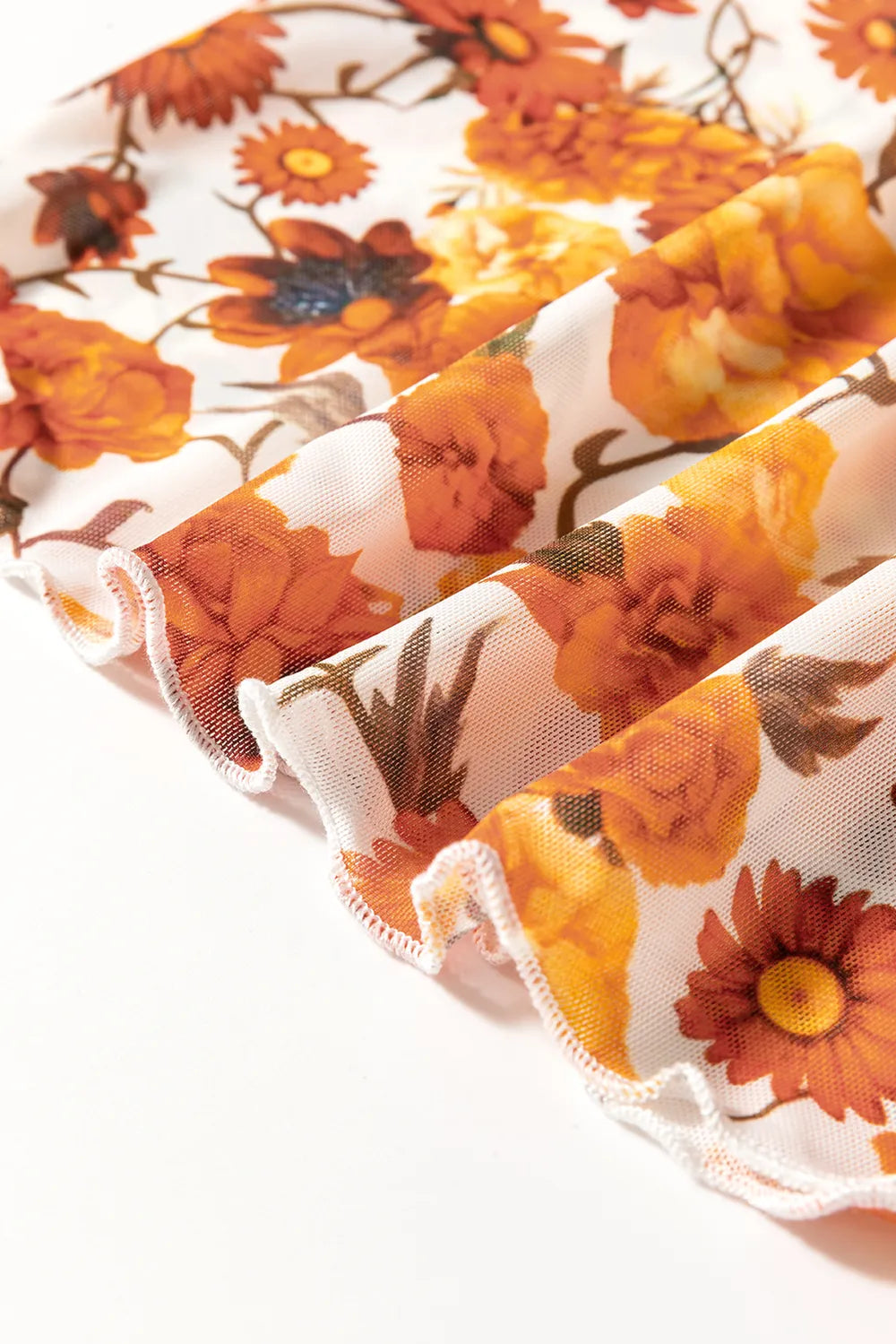 Printed mock neck top with flare sleeves in slightly stretchy polyester fabric.