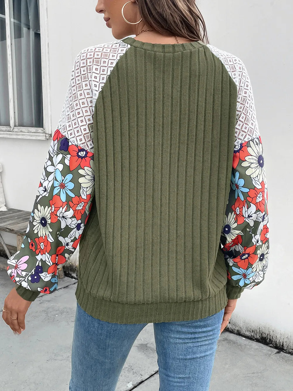 Long sleeve round neck knit top with printed design in polyester blend fabric