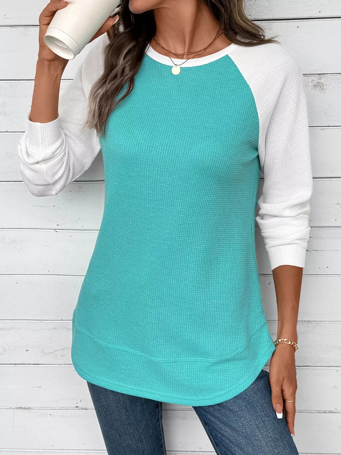 Lightweight waffle knit t-shirt with contrast raglan sleeves and a slightly stretchy fit.