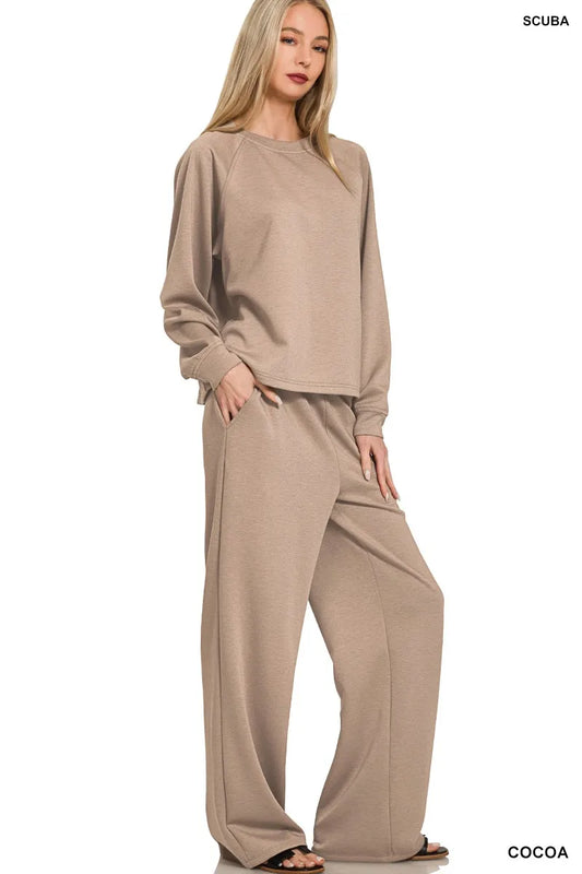 Woman modeling cocoa-colored scuba crewneck sweatshirt and palazzo pants set.