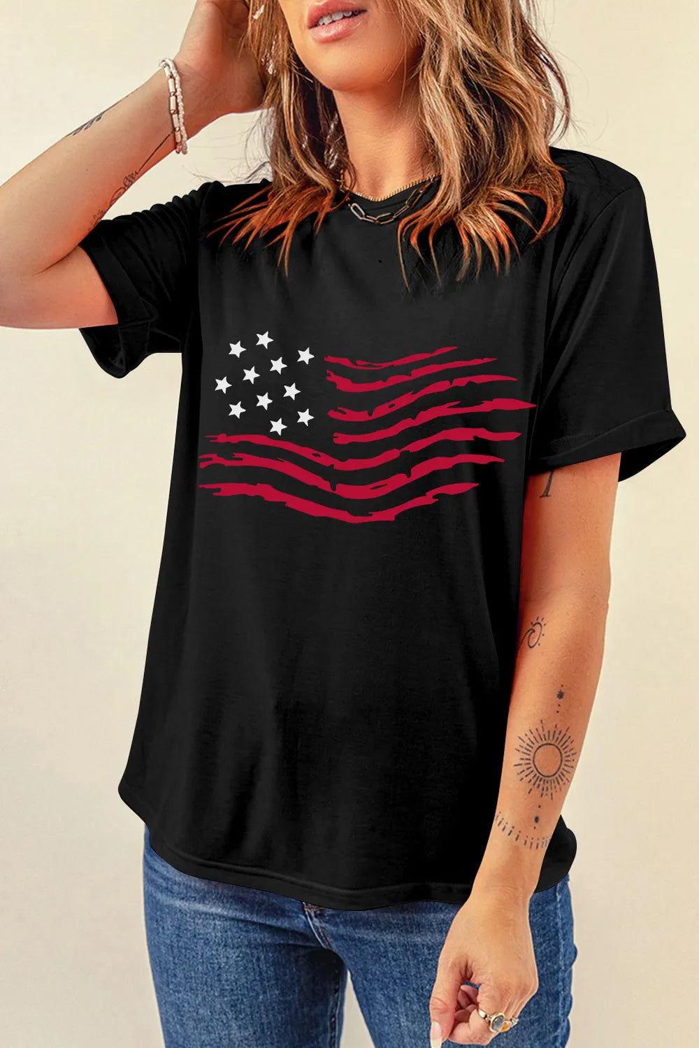 Short sleeve US flag t-shirt with round neck in polyester blend fabric.