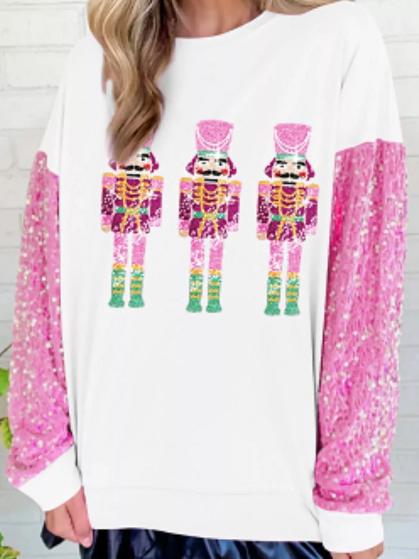 Long sleeve sweatshirt with sequins, perfect for holiday gatherings and casual wear.