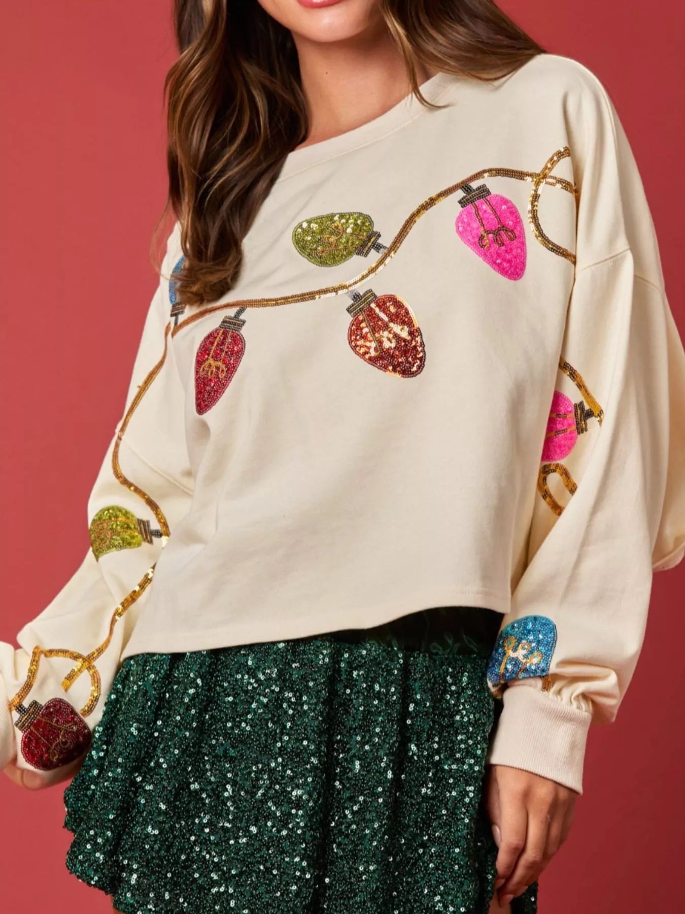 Sequin embellished polyester sweatshirt with long sleeves and holiday sparkle detail
