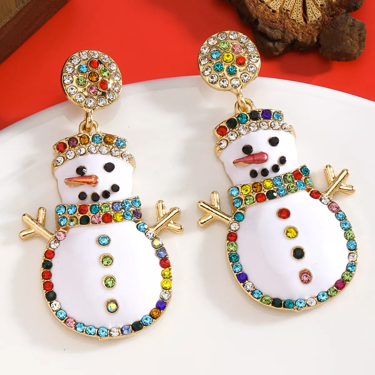 Pair of 18K gold-plated snowman drop earrings with colorful zircon accents.