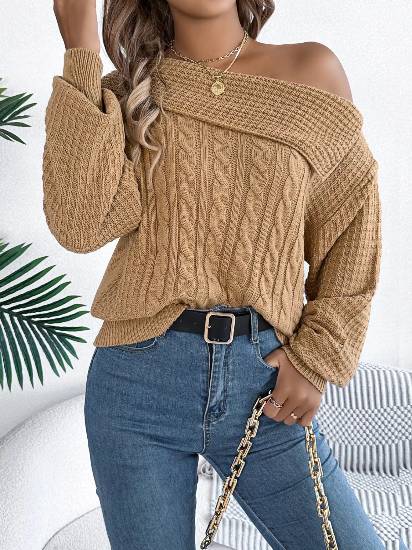 Cable knit off-shoulder sweater in soft acrylic with slight stretch and classic texture