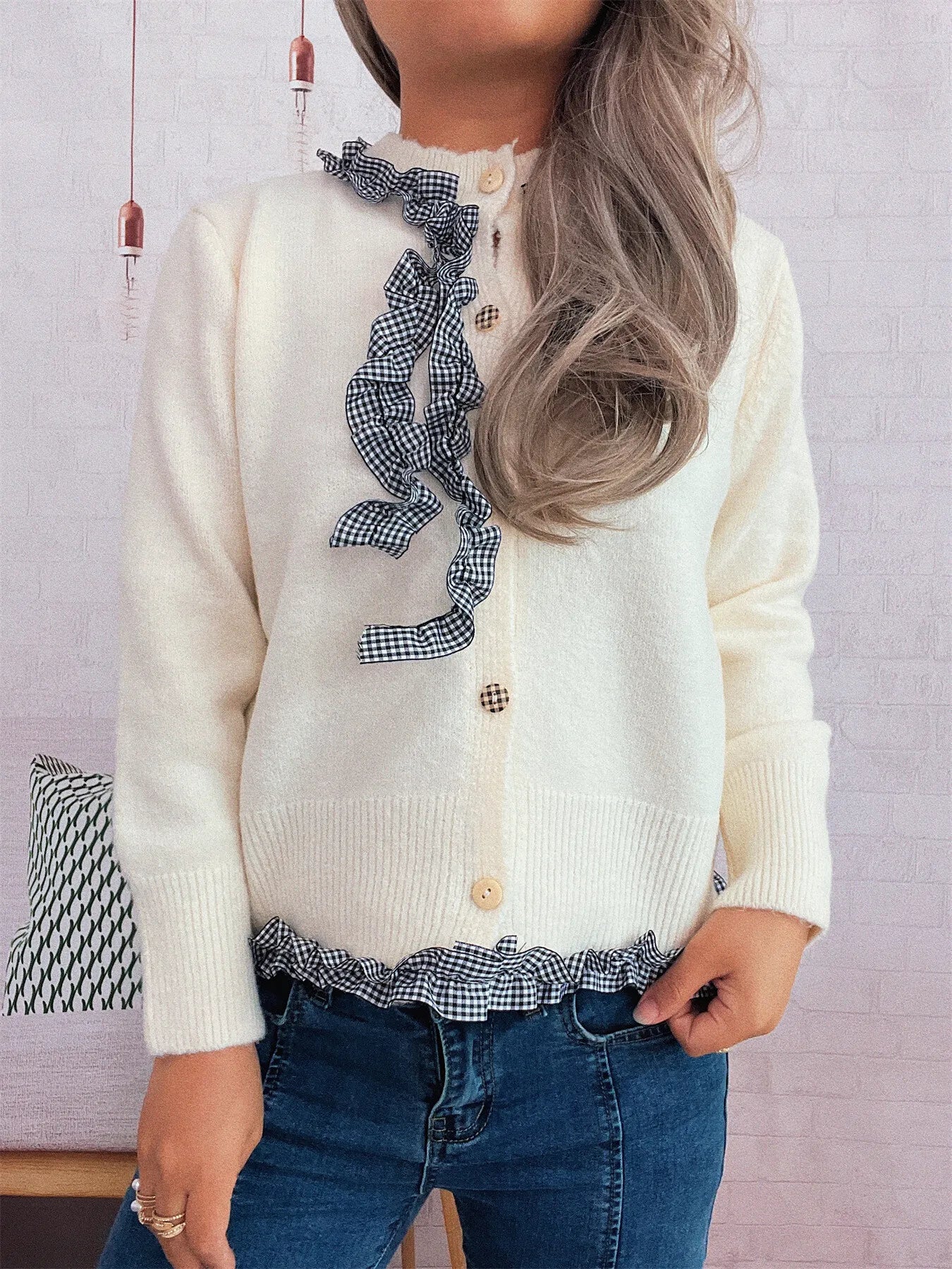 White and black gingham cardigan with ruffle trim and buttons made of stretchy polyester