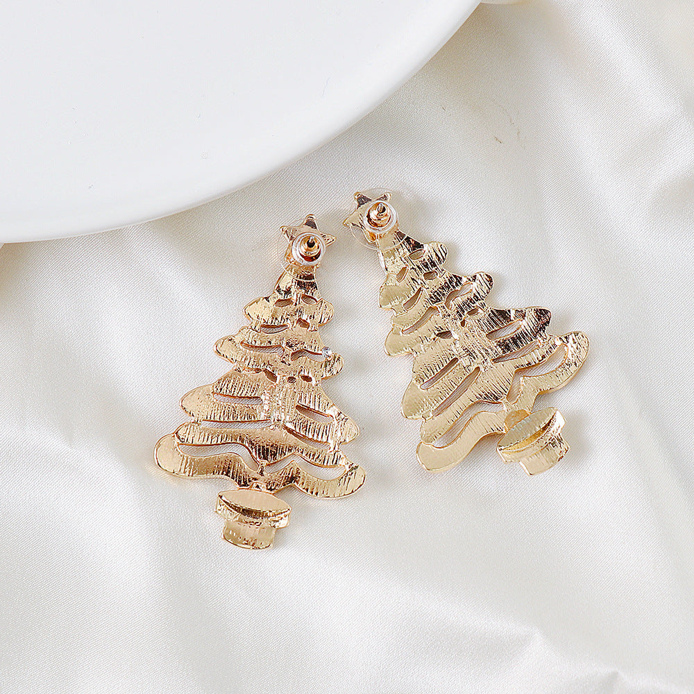 Pair of gold alloy Christmas tree stud earrings with rhinestone accents.