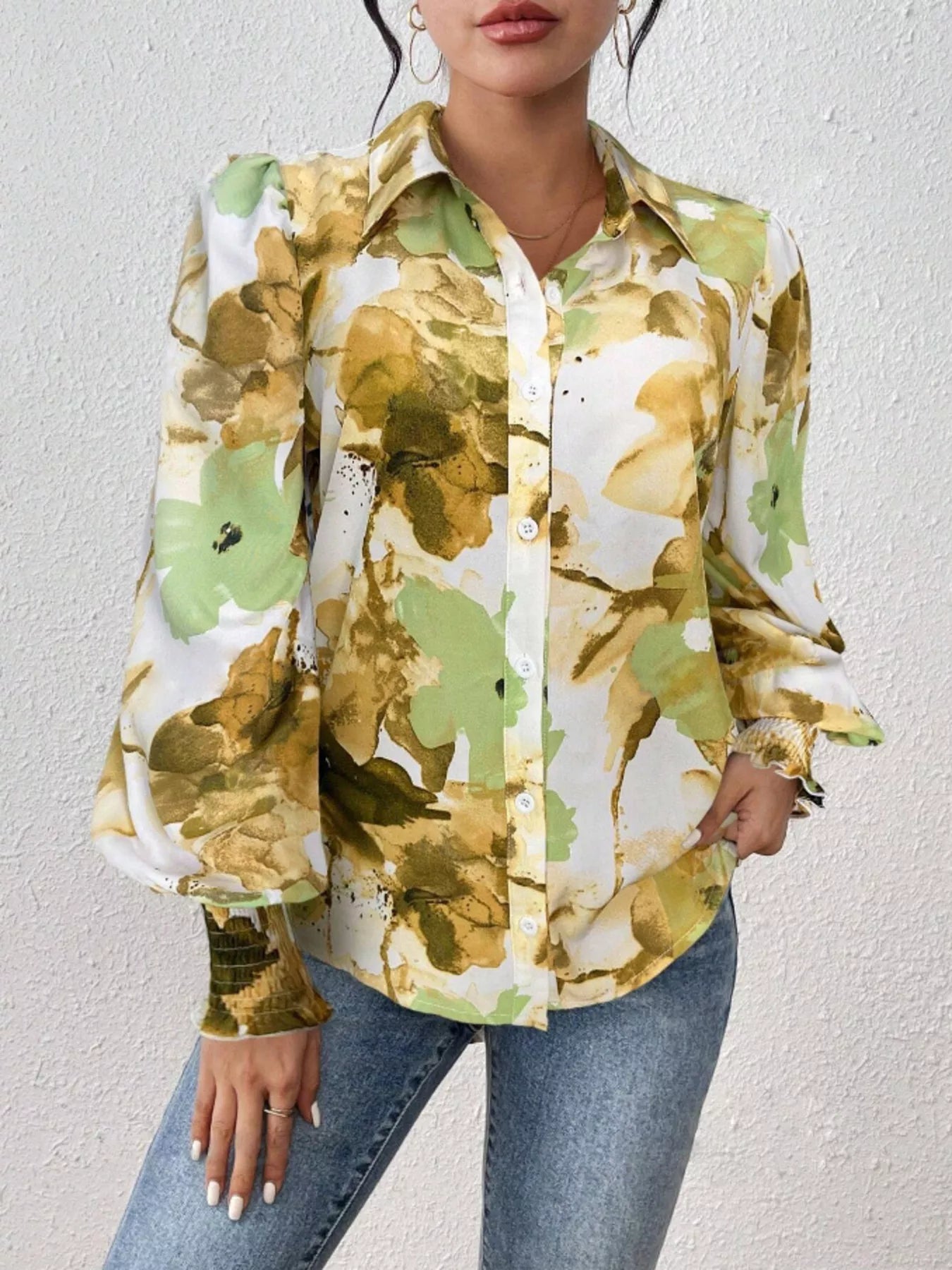 Printed button-up shirt with lantern sleeves in a polyester blend fabric.