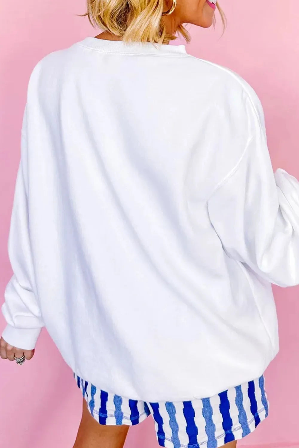 US flag long sleeve sweatshirt in a cotton blend with a round neck and opaque fabric.