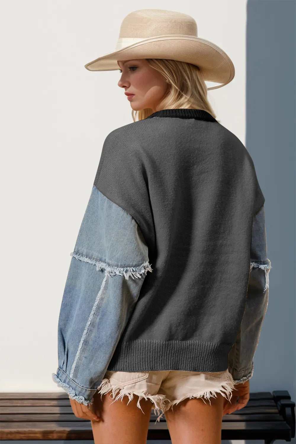Long sleeve sweater with a raw edge and star pattern in a cotton blend fabric.