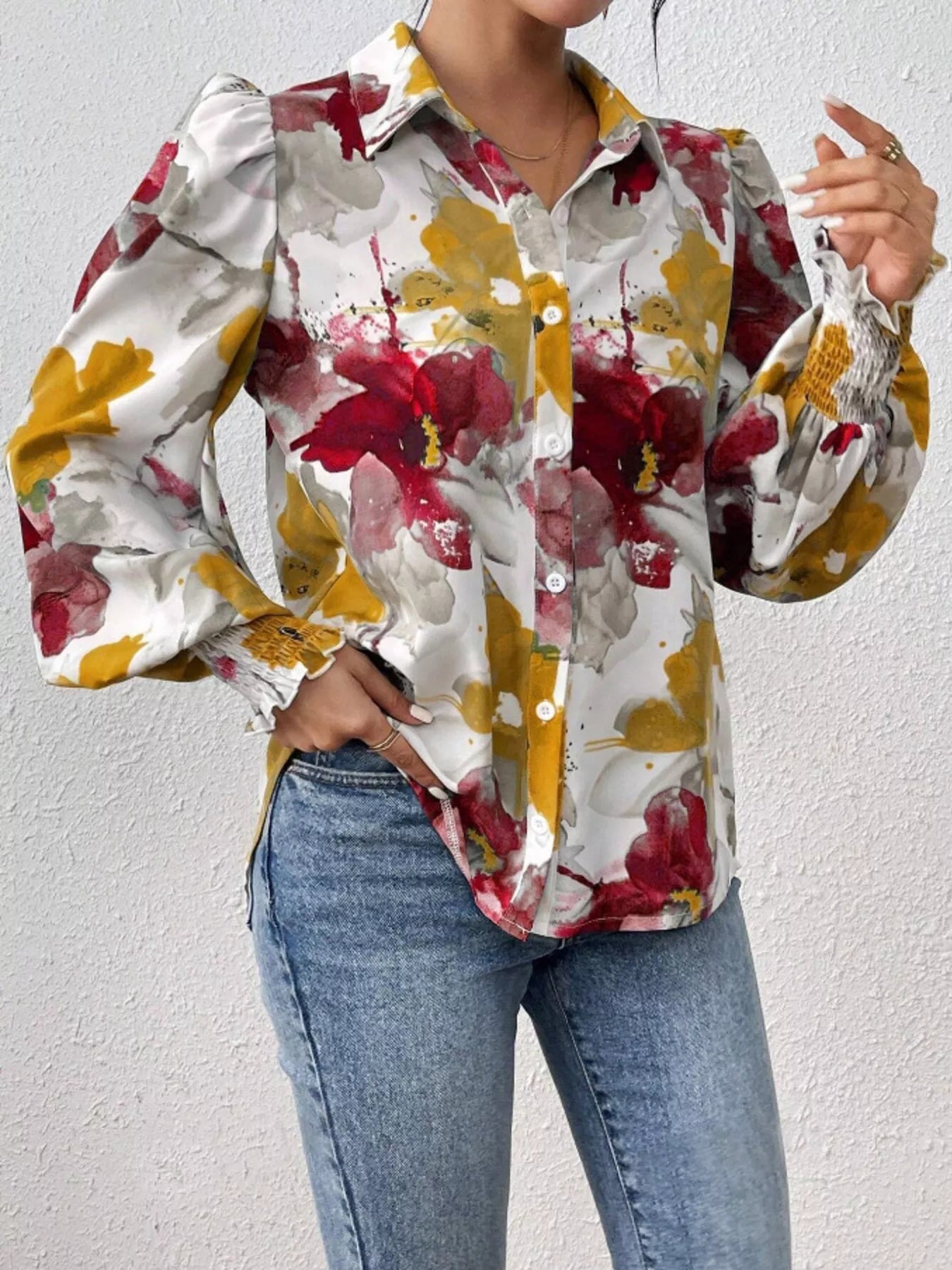 Printed button-up shirt with lantern sleeves in a polyester blend fabric.