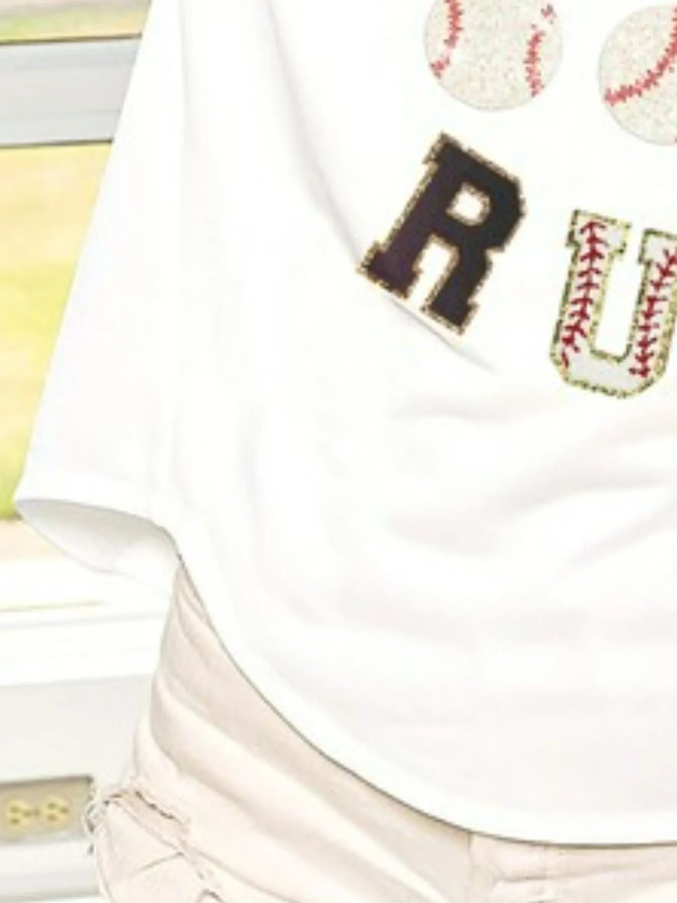 White short-sleeve cotton top with baseball and "RU" homerun graphic.