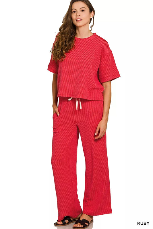 Woman modeling red Zenana raised rib short sleeve tee and drawstring pants set.