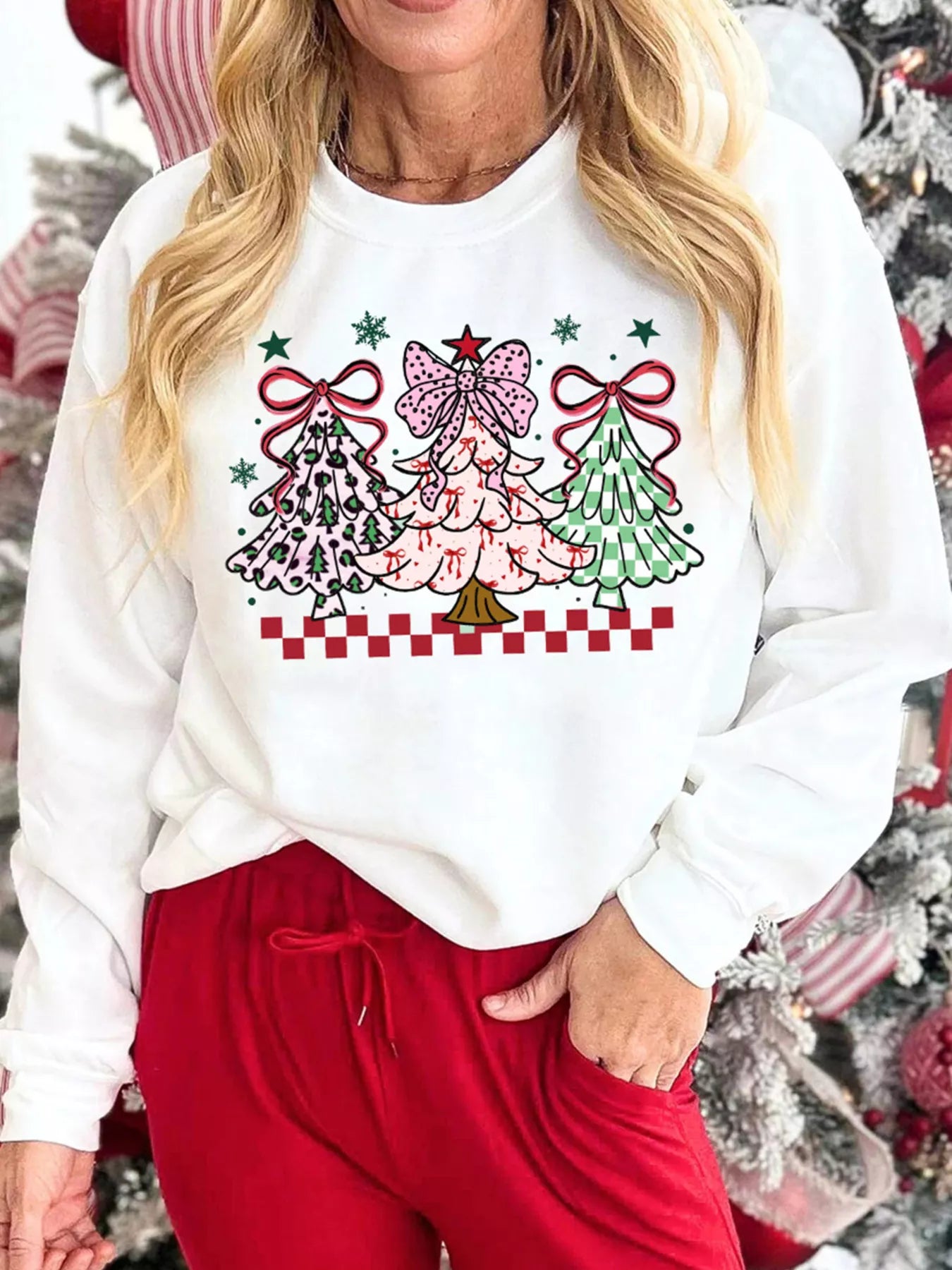 Cozy holiday sweatshirt with a Christmas tree graphic in a cotton-polyester blend fabric