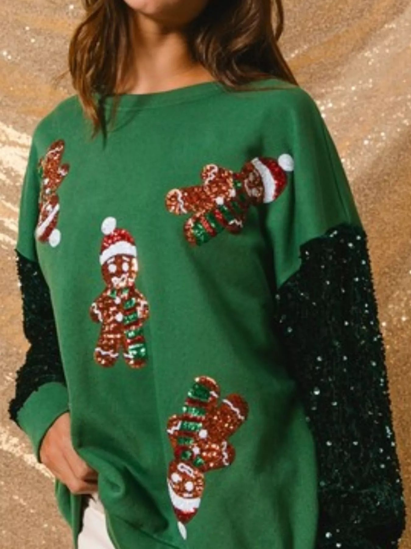 Long sleeve sweatshirt with delicate sequins and a comfortable fit for holiday wear.